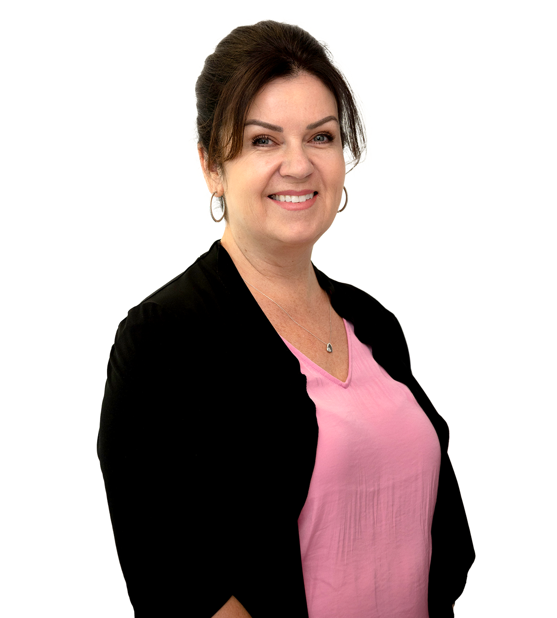 Headshot of a smiling woman, Rhonda Evraire, in a pink shirt and black sweater